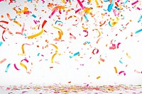 Colorful confetti and ribbons falling background celebration celebratory.