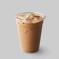 An isolated plastic cup of an ice machiato coffee drink beverage refreshing.