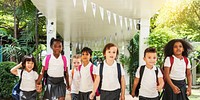 Back to school. Diverse students with backpacks, boys and girls. Group of students ready for school with backpacks. Back to school with students and backpacks. Back view of diverse students at school