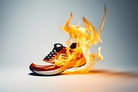 Photography of a Burning running shoe fire footwear bonfire.