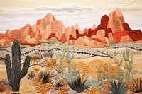 Desert landscape pattern quilt.