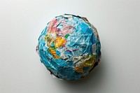 A globe made entirely from Collage paper material sphere art creativity.
