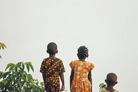 Smiling African kids togetherness portrait standing.