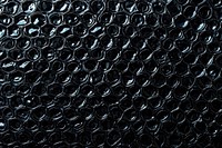 Star pattern bubble wrap texture black backgrounds repetition.