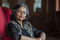 Senior indian businesswoman necklace portrait glasses.