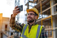 An engineering take a selfie at constuction site hardhat helmet adult.