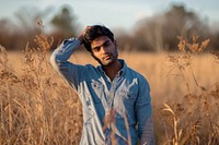 Indian american man portrait outdoors nature.