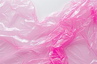 Pink plastic wrap sealed backgrounds crumpled wrinkled.