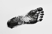 The left foot imprint of a man on a white background finger hand monochrome.