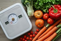Weight loss scale with vegetable food medication freshness.