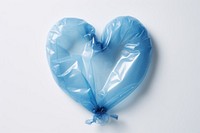 Plastic wrapping over a heart balloon white background petal.