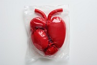 Plastic wrapping over a heart white background representation symbol.