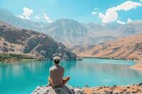 Traveler Middle eastern Man relaxing lake landscape mountain.