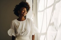 Black woman wearing Curator LEMON CHIFFON smile adult white.