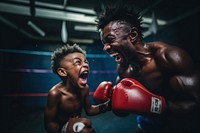 African American dad and son boxing punching sports.