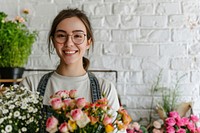 Adult woman florist smile portrait glasses.