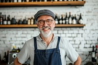 Mature man owner glasses working adult.