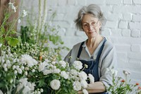 Middle age woman florist working flower adult.