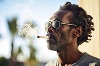 Black man smoking glasses smoke adult.