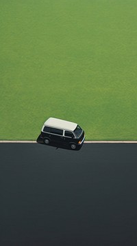 Black van parking on green lawn vehicle car transportation.