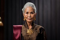 Thai female elder model necklace portrait jewelry.