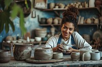 Female multi ethnic ceramist at pottery studio art craftsperson entrepreneur.