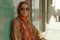 Middle Eastern senior woman portrait glasses fashion.