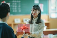 Japanese high school woman gift red togetherness.