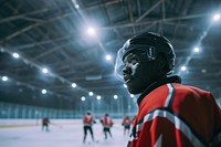 Black man hockey sports helmet.
