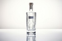 Vodka bottle glass drink white background.