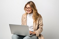 Woman using laptop computer glasses sitting. AI generated Image by rawpixel.