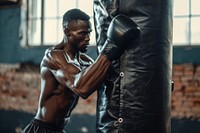 Black man punching sports boxing.