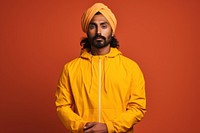 Indian man sweatshirt portrait photo.
