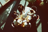 People group meeting restaurant shadow table.