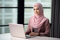 Muslim woman computer laptop office. AI generated Image by rawpixel.