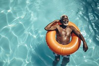 Kenyan man recreation swimming portrait.