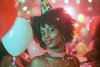 Black woman at birthday party balloon adult fun.