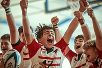 Young rugby players celebrating basketball cheerful shouting.