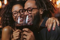 Happy black man couple celebrating embracing drinking laughing.