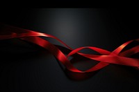 Red ribbon appliance darkness abstract.