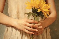 Woman hand holding sunflower painting finger plant.