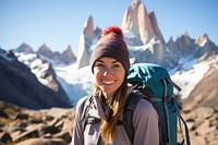Smiling Latina with backpack mountain outdoors backpacking.