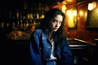 Young female stand in a Irish pub photography portrait fashion.