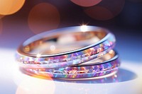 Wedding ring pattern bokeh effect background jewelry bangles light.