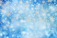 Blue snow flakes pattern bokeh effect background backgrounds snowflake glitter.