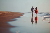 Indian young couple walking beach love.