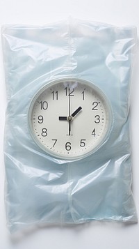 Plastic wrapping over a clock deadline number circle.