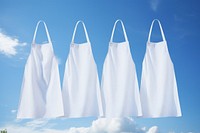 White blank kitchen cotton apron handbag blue sky.