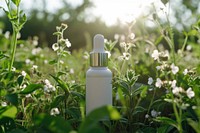 Skincare dropper packaging  nature flower outdoors.