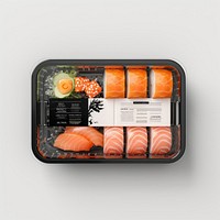 Sealable black plastic tray and cover with sushi and blank label  packaging seafood salmon meal.